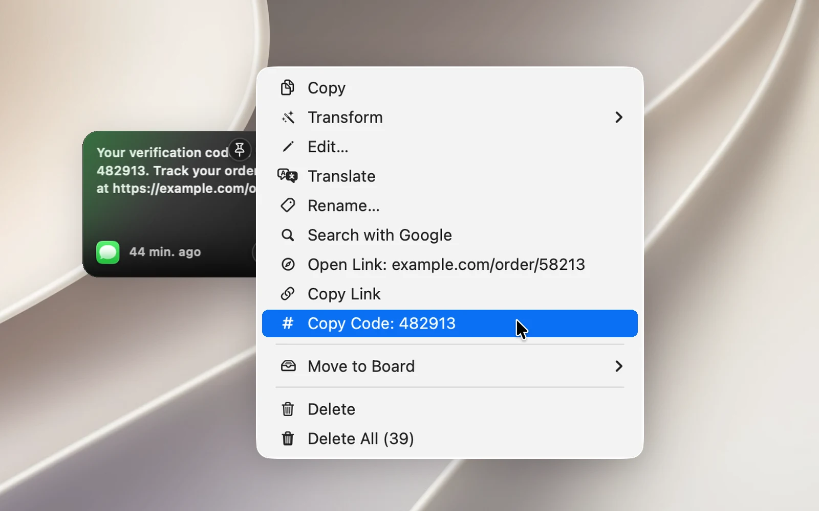 The right-click menu of a text clip that contains a one-time code and a link