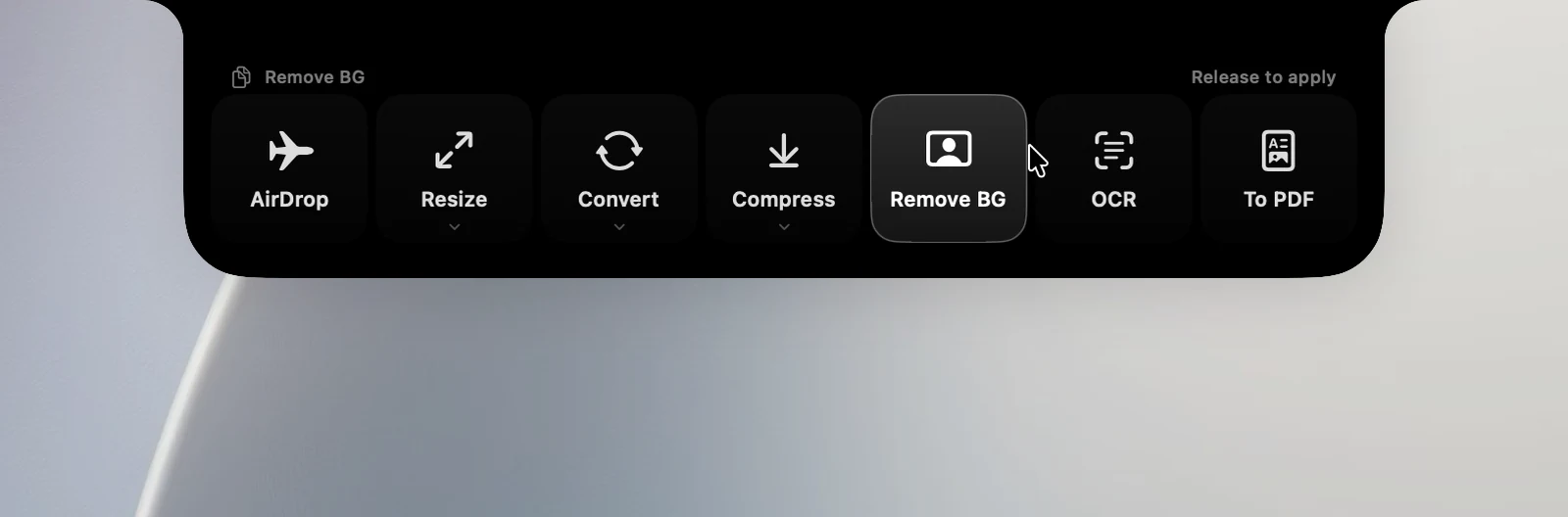 The notch opening drop zones as 2 images are dragged toward it: AirDrop, Resize, Convert, Compress, Remove BG, OCR, To PDF