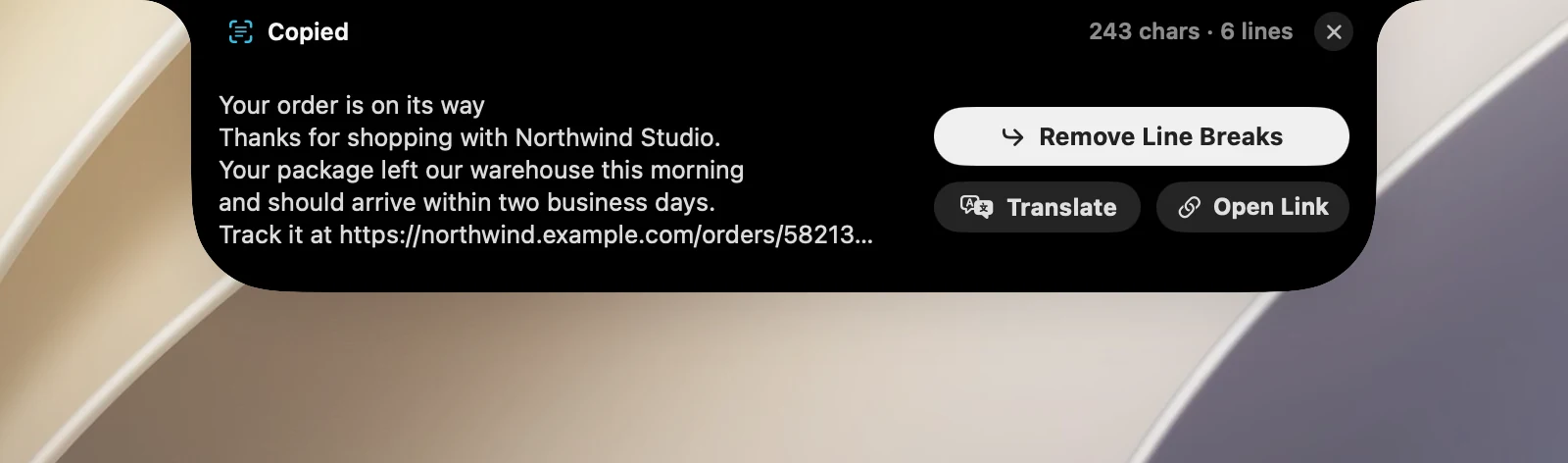 The OCR result card under the notch: Copied, the character and line count, a 5-line preview, and the Remove Line Breaks, Translate and Open Link buttons