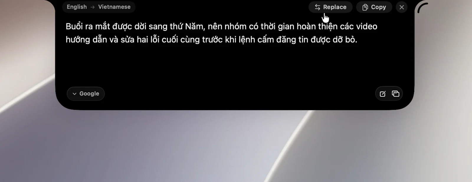 The top of a translation result in the notch, with the Replace button beside Copy