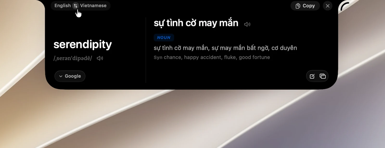 The language chip at the top of a translation result, with the → arrow turning into ⇄ on hover